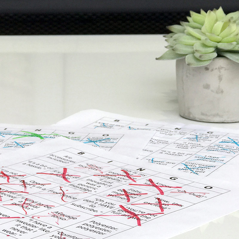 Bingo cards with words and phrases from the videos, some of which are marked as called.